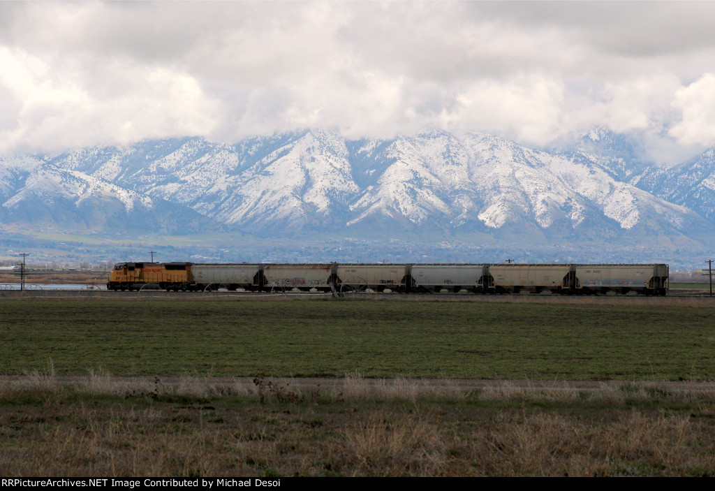 UP SD59MX #9907 is ready to head to Trenton, leading the Cache Valley Local (LCG-41E) at Cache Junction, Utah. April 15, 2022